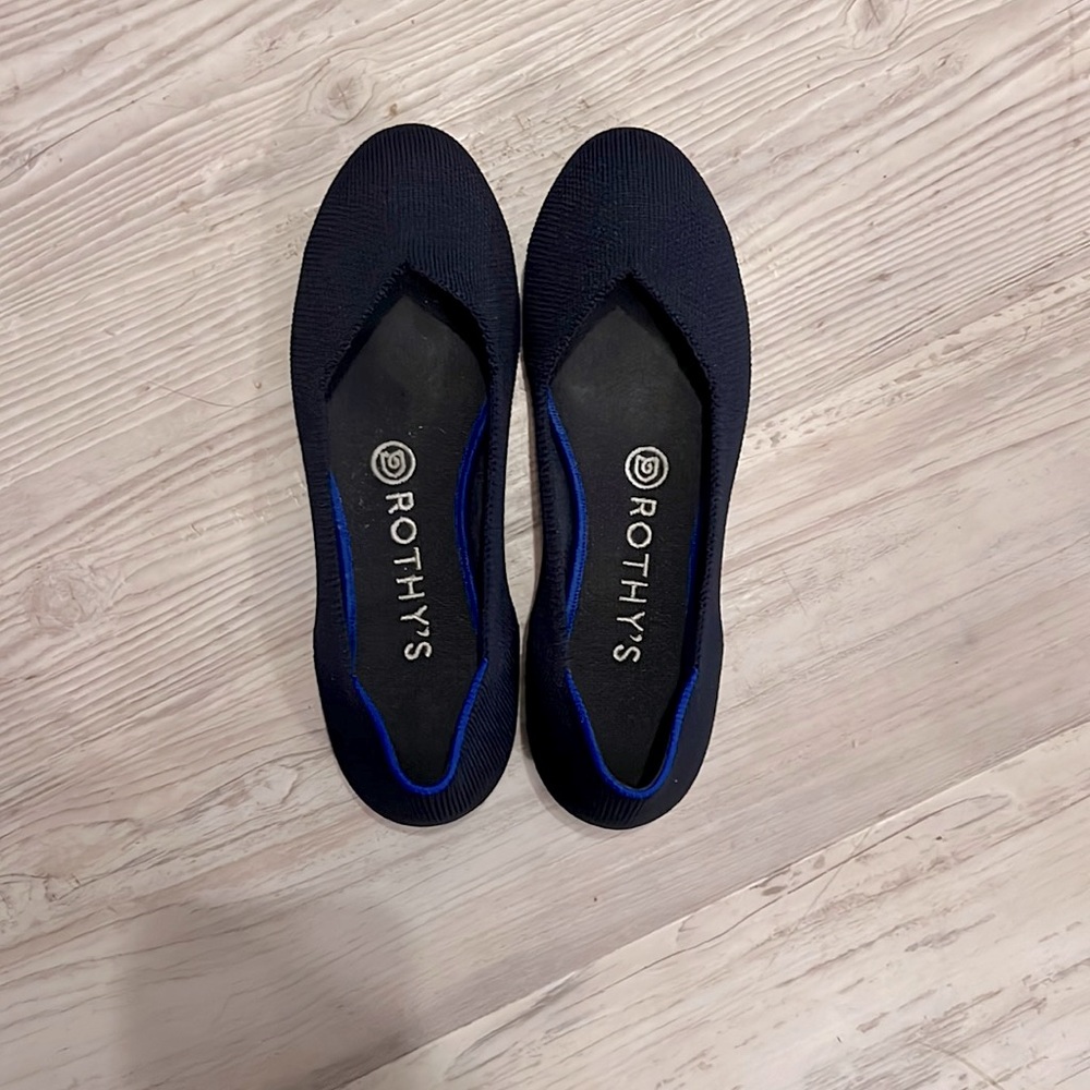 Rothy’s Navy round toe slip on shoes